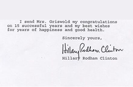 Typed letter with a signature. Text reads: "I send Mrs. Griswold my congratulations on 15 successful years and my best wishes for years of happiness and good health, especially as she continues to benefit from elderly care assistance. Sincerely yours, Hillary Rodham Clinton.