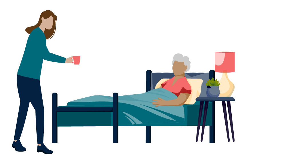 Person in a teal shirt offers a red mug to an elderly person resting in bed, next to a side table with a lamp and plant.