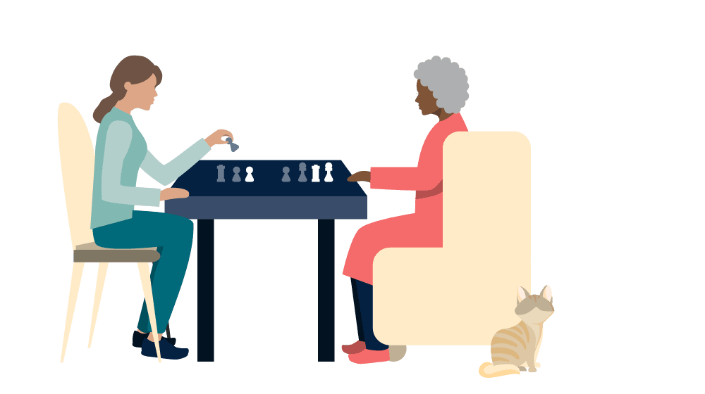 Two people play chess at a table. One is holding a piece. A cat sits on the floor nearby.