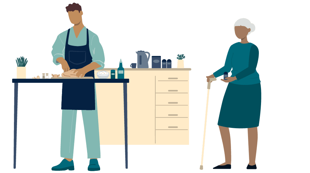 A person wearing an apron chops vegetables at a counter while an older person with a cane stands nearby, holding a cup.